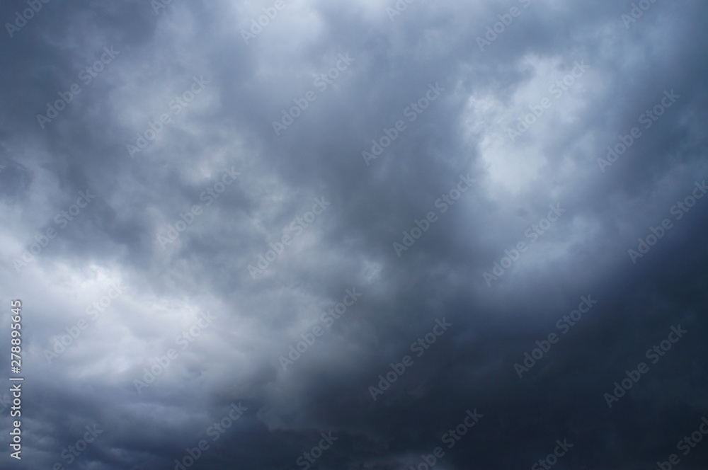 White and blue contrasting blue clouds in the sky. White and blue contrasting blue clouds in the sky.