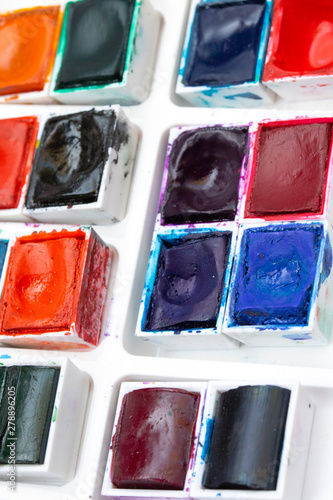 Colourful Watercolour Pallet of Messy Used Half Pan Paints