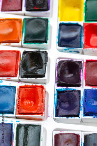 Colourful Watercolour Pallet of Messy Used Half Pan Paints