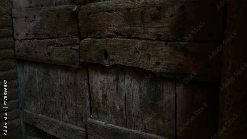 wooden door in the historic center of Nemi, Roman castles wooden door in the historic center of Nemi, Roman castles