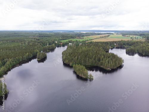 Aerial view of lake Nedre Dammen in Gammelstilla, Gästrikland, Sweden with the small island outside Skoludden. 