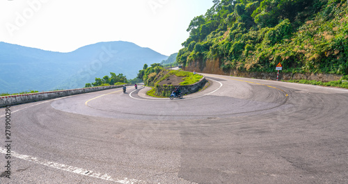 Hue, Vietnam - April 11th, 2019: Hai Van Pass road dangerous winding mountain connecting strips in central Vietnam, the road also attracts many conquerors in Hue, Vietnam