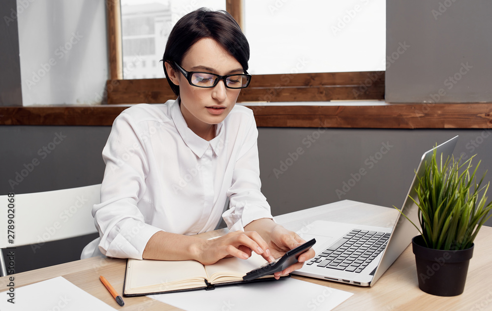 business woman working on her laptop business woman working on her laptop