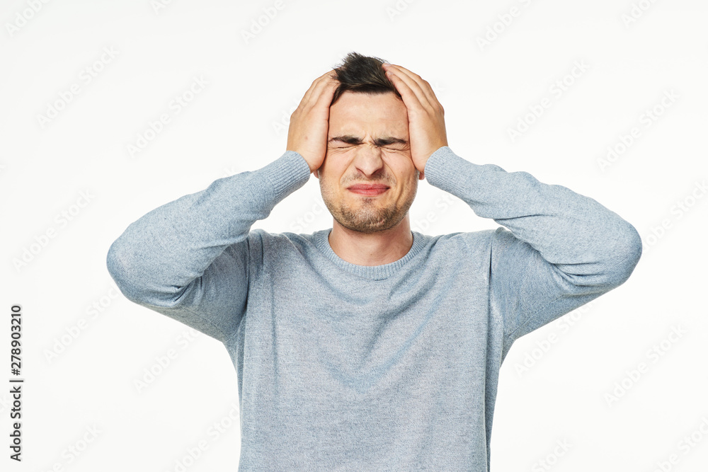 young man with headache young man with headache