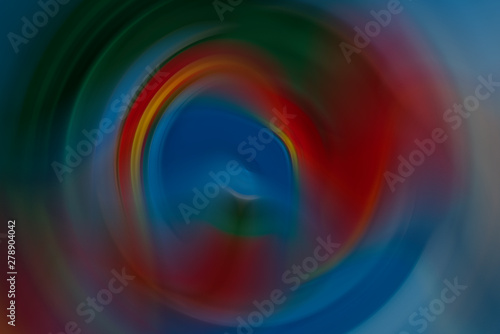 Soft ripple action of sound sonic wave formed in centre, colourful ranged from blue, red, green, orange and yellow rounded and mixed in background. Abstract in shape, form and meaning and inspiration.