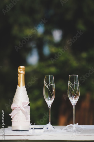 two glasses of champagne on table
