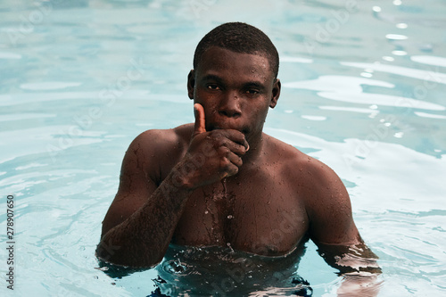 man in swimming pool © SHOTPRIME STUDIO