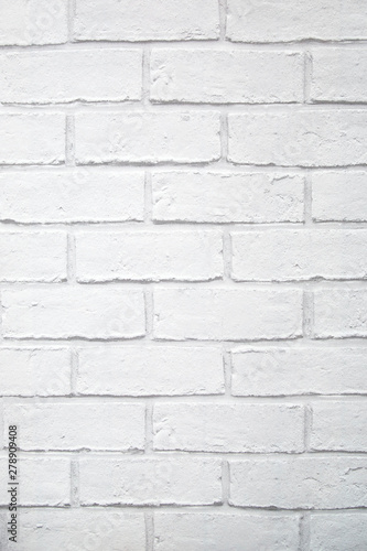 White painted brick wall in a vertical format - backgrounds and textures