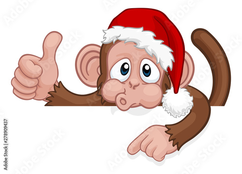 A Christmas monkey animal cartoon character in a Santa hat behind a sign peeking over a sign and pointing at it while giving a thumbs up