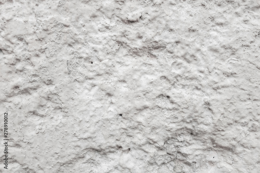 abstract background of a shabby old wall painted in white close up abstract background of a shabby old wall painted in white close up