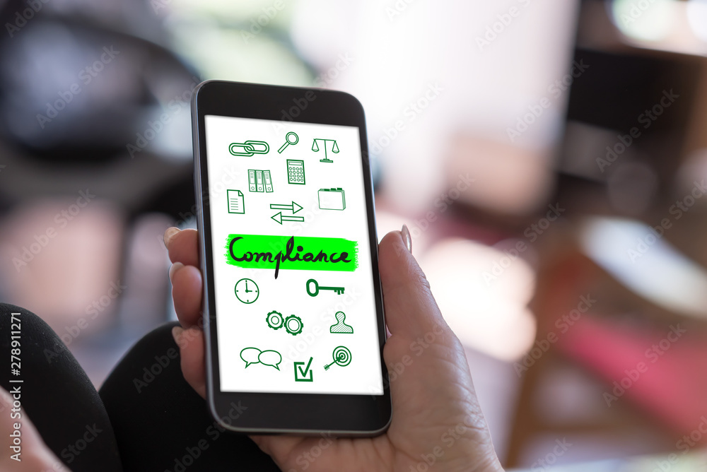 Fototapeta premium Compliance concept on a smartphone