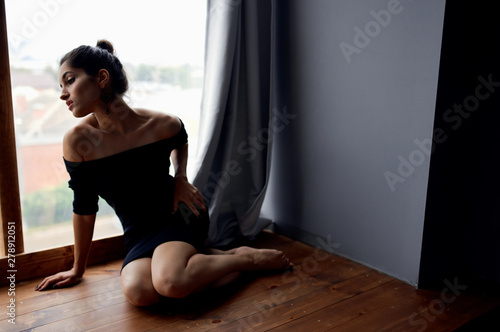 woman sitting on the floor