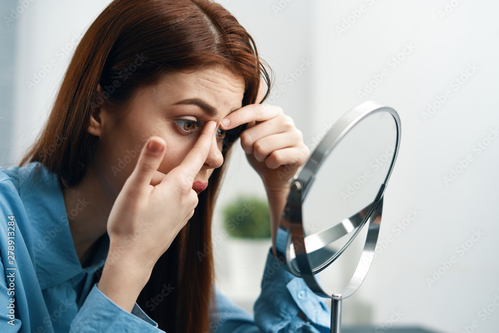 portrait of young woman with magnifying glass of red wine portrait of young woman with magnifying glass of red wine