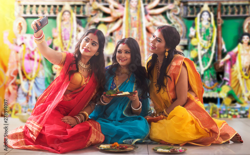 Three Bengali Women Doing Prepartion For durga Pooja with selfie photo