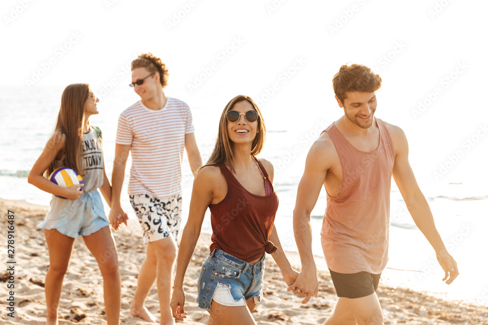 Group of cheerful happy young friends having fun Group of cheerful happy young friends having fun