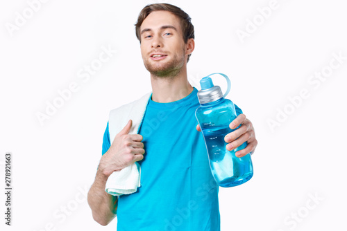 young woman with bottle of water