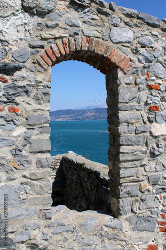 Arcata in pietra con vista mare photo