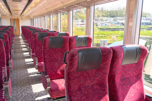 Interior of East Japan Railway Gono line Resort Shirakami sightseeing train in Akita station. the train rides from Akita to Aomori, operated by the East JR company photo