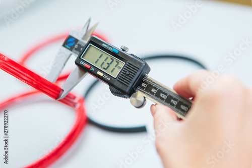 Caliper and plumbing materials including ring seals. Measurements of the size and diameter