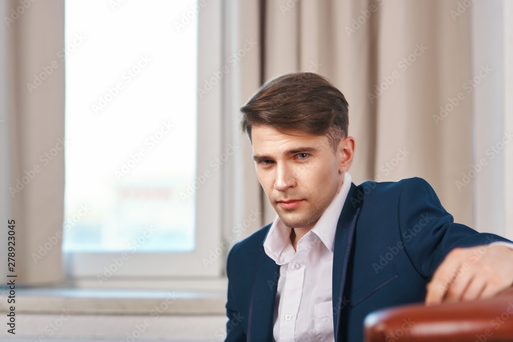 portrait of a businessman in office portrait of a businessman in office