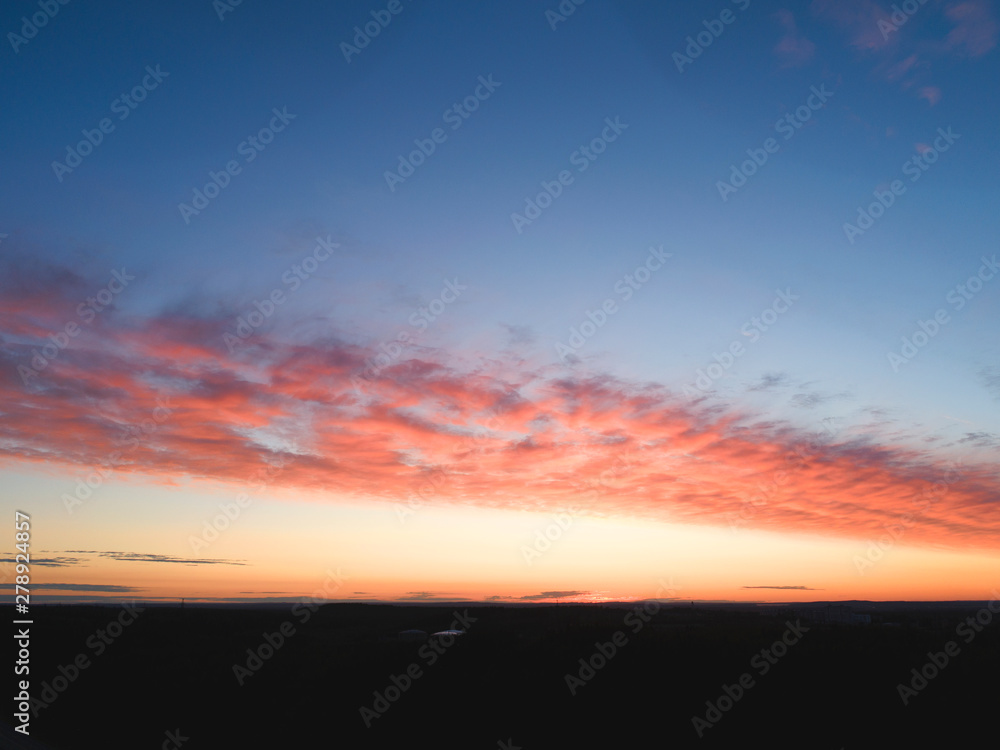 Sunset with beautiful red sky and clouds