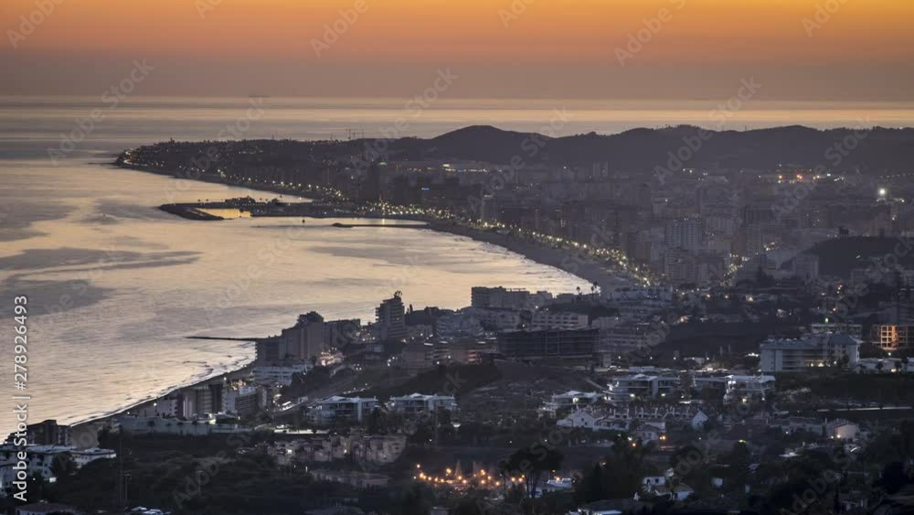 Sunset timelapse looking over Fuengirola city on the Costa del Sol in Spain Sunset timelapse looking over Fuengirola city on the Costa del Sol in Spain