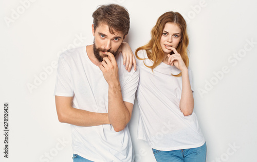 Young couple in white t-shirts