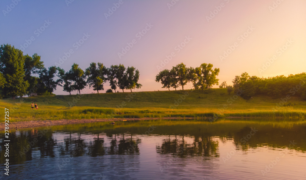 Sunset on the edge of a lake in the country, Moldova, 2019 Sunset on the edge of a lake in the country, Moldova, 2019