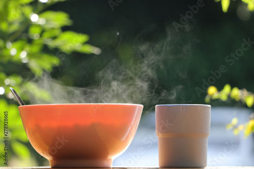 Boiled rice, hot breakfast that still has floating steam