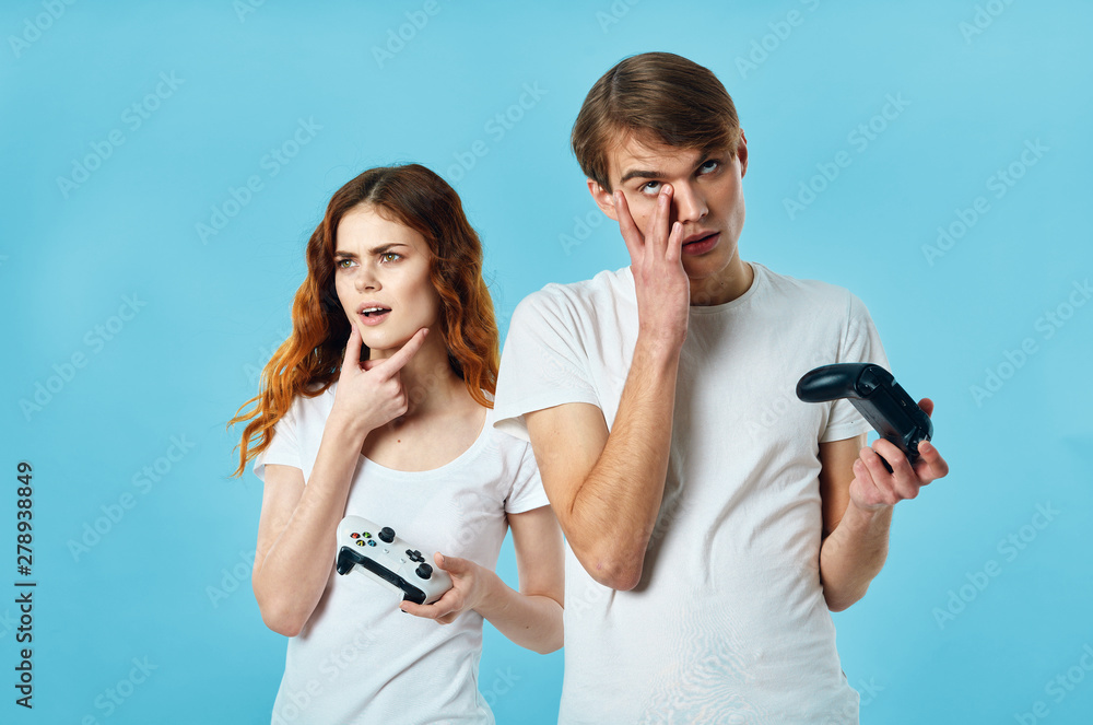 young couple taking photo of themselves with mobile phone young couple taking photo of themselves with mobile phone