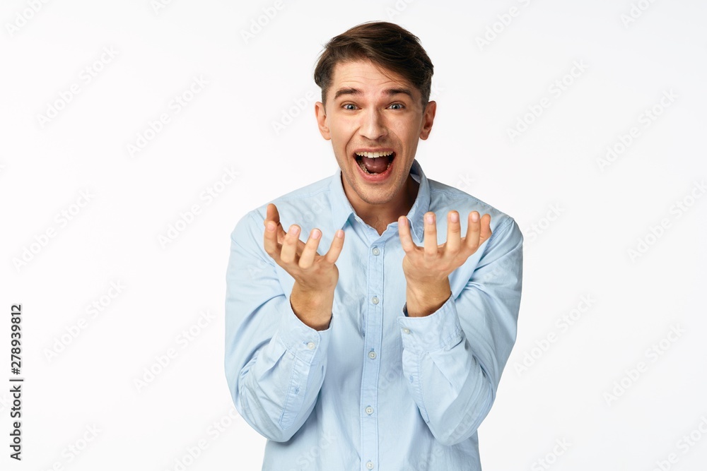 young man with thumbs up gesture isolated on white young man with thumbs up gesture isolated on white