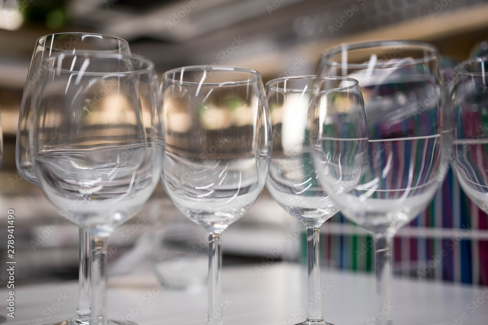 Obraz premium Closeup shot of wine drinking glasses top view macro blurry background