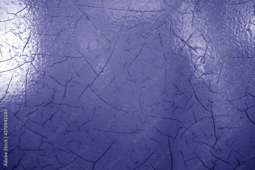 Fototapeta premium Cracked paint texture in blue color.