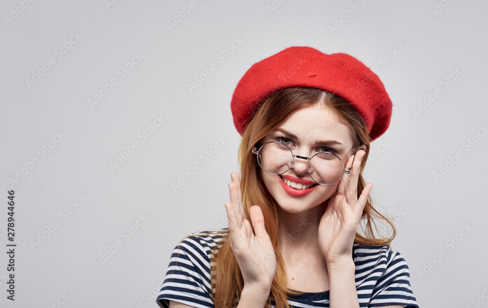 portrait of young woman in red hat portrait of young woman in red hat
