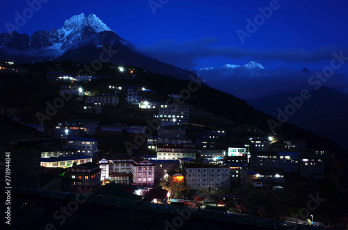 Night view of Namche Bazaar village and Thamserku mountain  Sagarmatha national park  Khumbu valley  Himalayas  Nepal