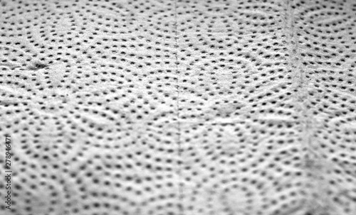 Paper towel surface with blur effect in black and white.