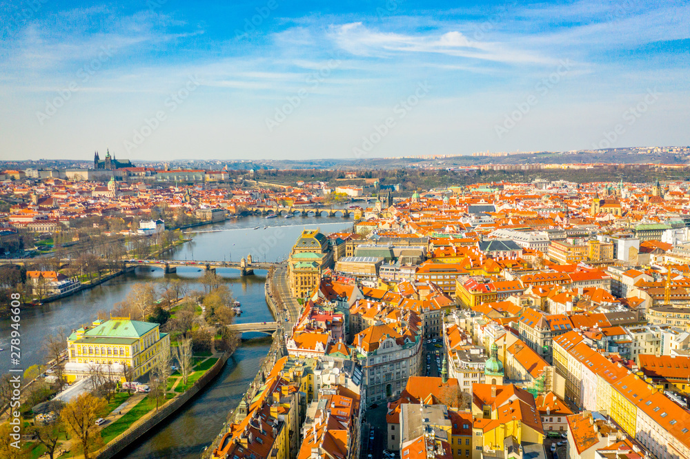Aerial Panoramic View of Prague City above the River, Bridges and Old Town at Sunset Time