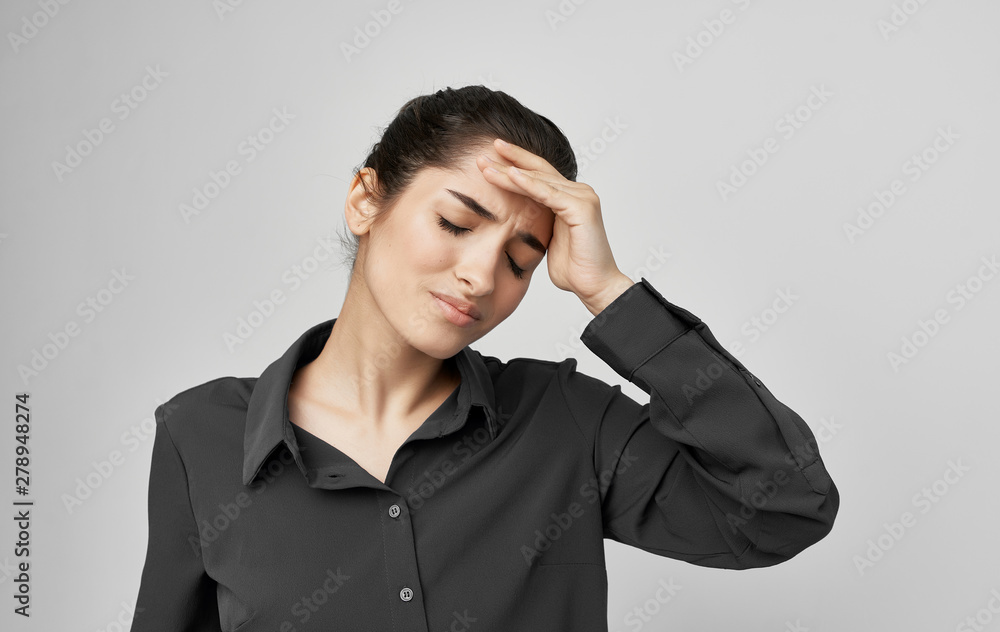 young woman with headache isolated on white young woman with headache isolated on white