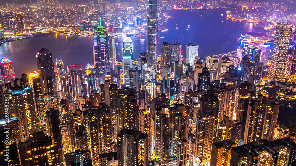 High view of Hong Kong skyline cityscape night light over Victoria harbour at Victoria Peak
