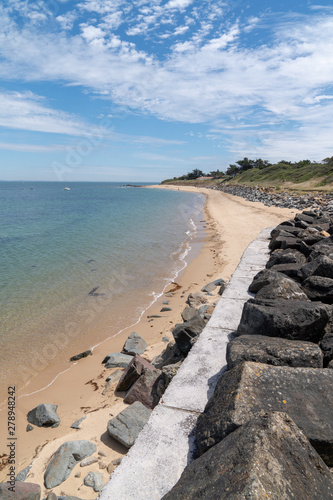 Beach and dike on the island of Noirmoutier in Pays de la Loire Vendee France