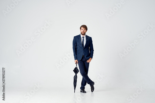 businessman standing on top of stairs