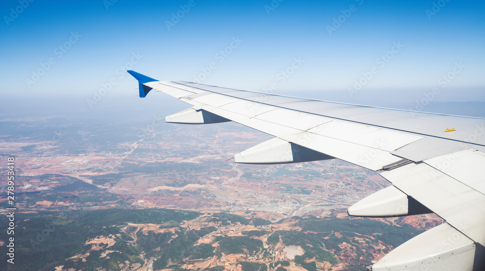 Aircraft wing view from airplane window Aircraft wing view from airplane window