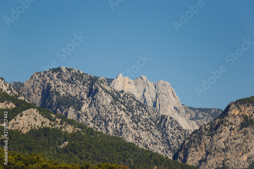 Beautiful landscape in the mountain view. Beautiful view of the Taurus mountains in the morning sun against the blue sky. Kemer  Turkey.