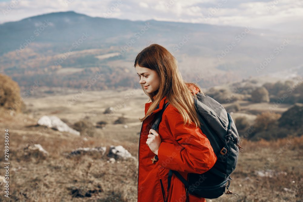 young woman in mountains