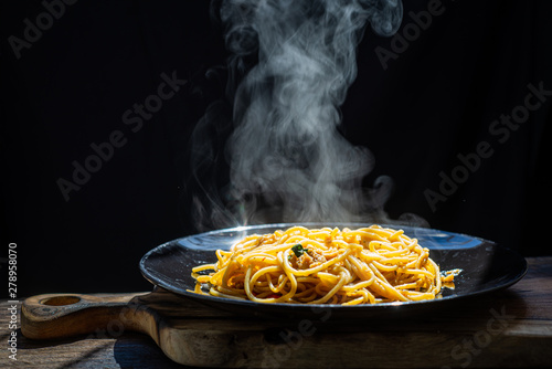 Foto The steam from spaghetti Carbonara pasta