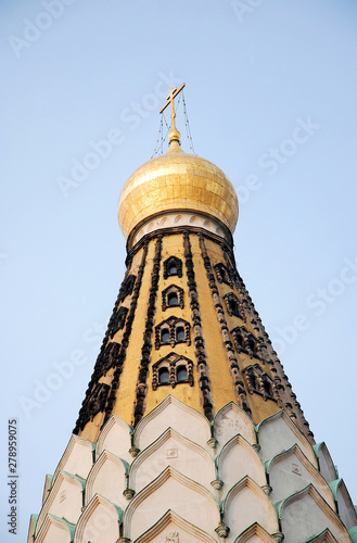russian orthodox church, golden tower with orthodox cross photo