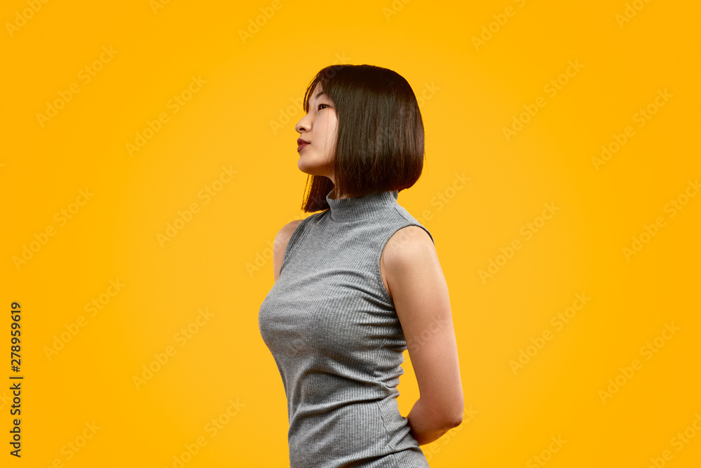 Stylish Asian woman looking away Stylish Asian woman looking away