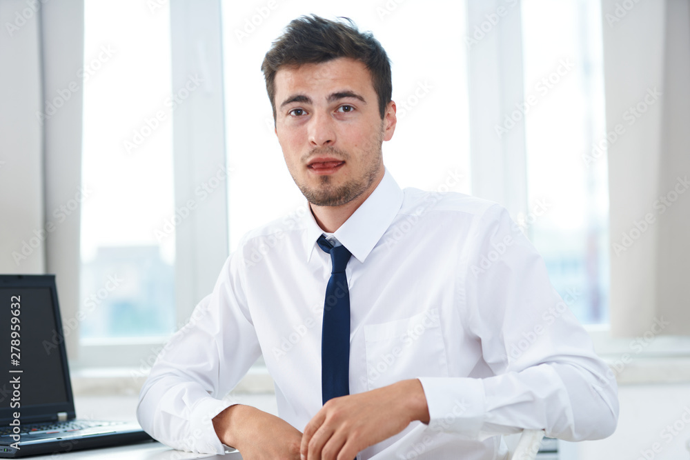 portrait of a businessman in his office