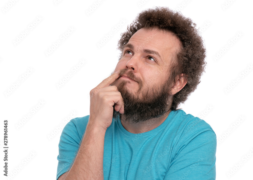 Crazy thoughtful bearded Man with funny Curly Hair - ponder and dreaming. Casual thinking guy, isolated on white background. Emotions, and signs concept. Crazy thoughtful bearded Man with funny Curly Hair - ponder and dreaming. Casual thinking guy, isolated on white background. Emotions, and signs concept.