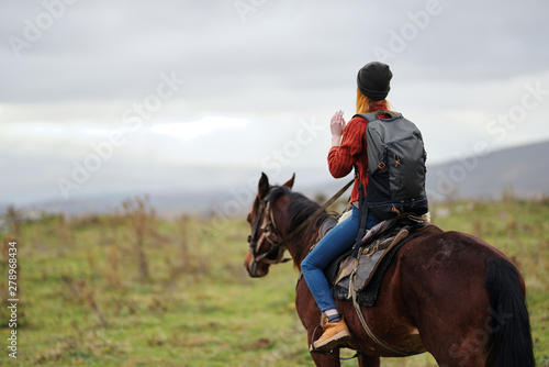 woman riding horse